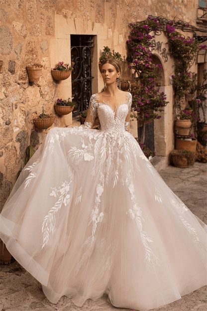 Long sleeve lace wedding dress with train
