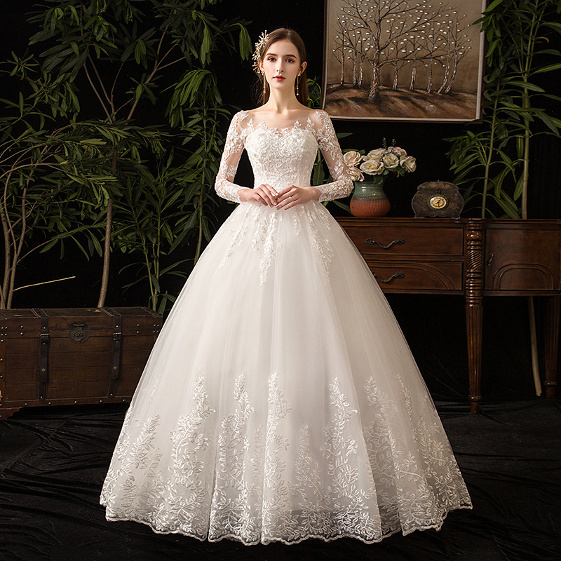 Long sleeve lace ball gown wedding dress front view by Howedding
